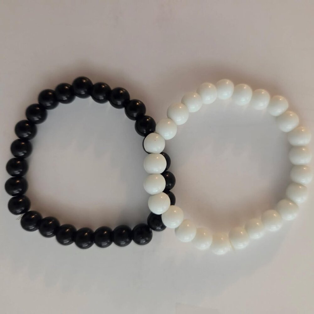 Black Onyx and white porcelain bracelets, new and unworn, still in package